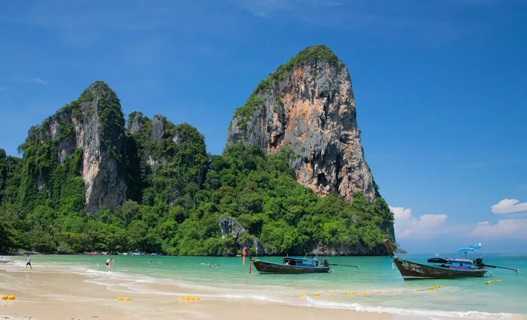 Railay Beach in Krabi — towering limestone karsts rising straight out of the Andaman shore